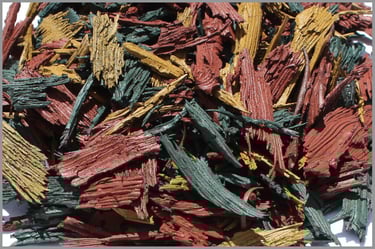 A close up of bonded rubber pieces cut to appear like wood chips