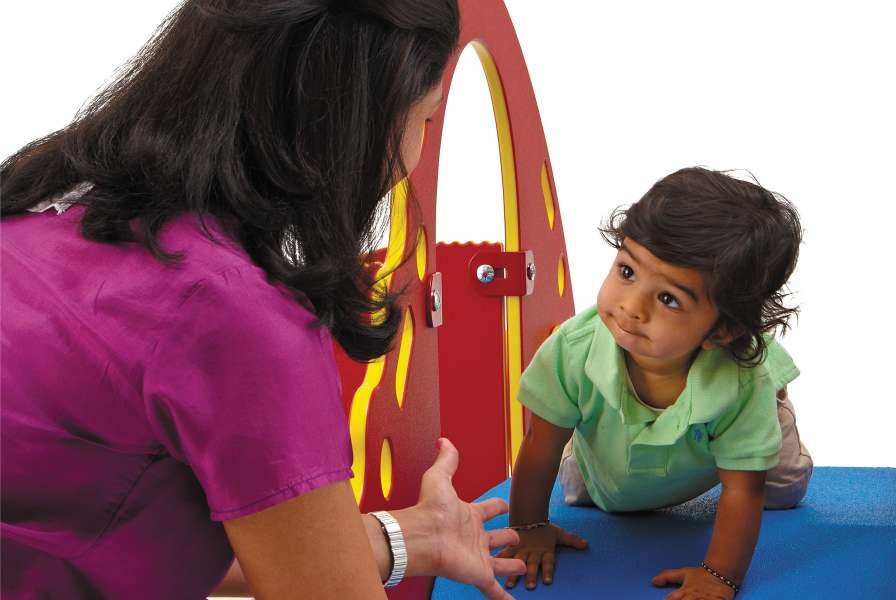 A woman playing with a young child